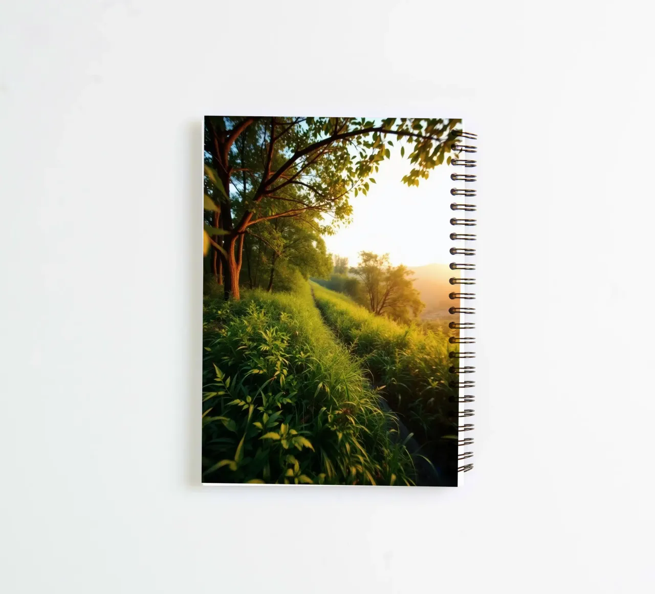 Serenity of a sunset walk through lush greenery along a wind spiral notebook by DesignDoodle