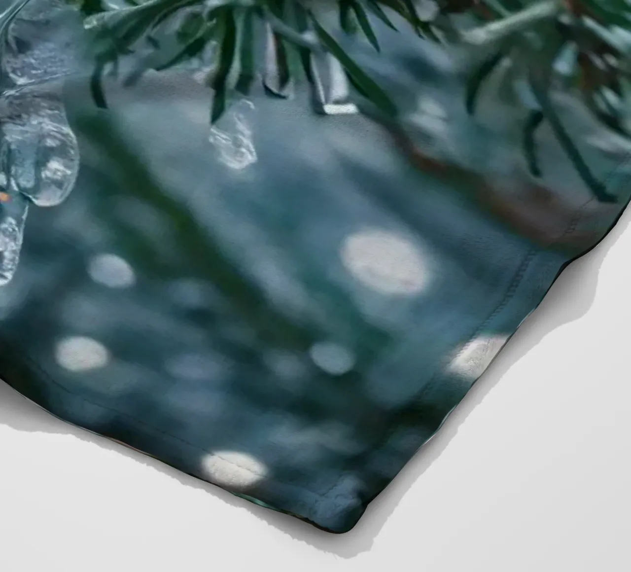 A butterfly resting on evergreen branches covered in frost fleece blanket by DesignDoodle
