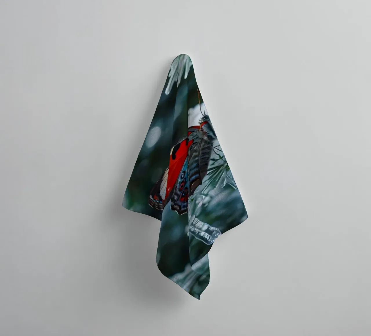 A butterfly resting on evergreen branches covered in frost towel by DesignDoodle
