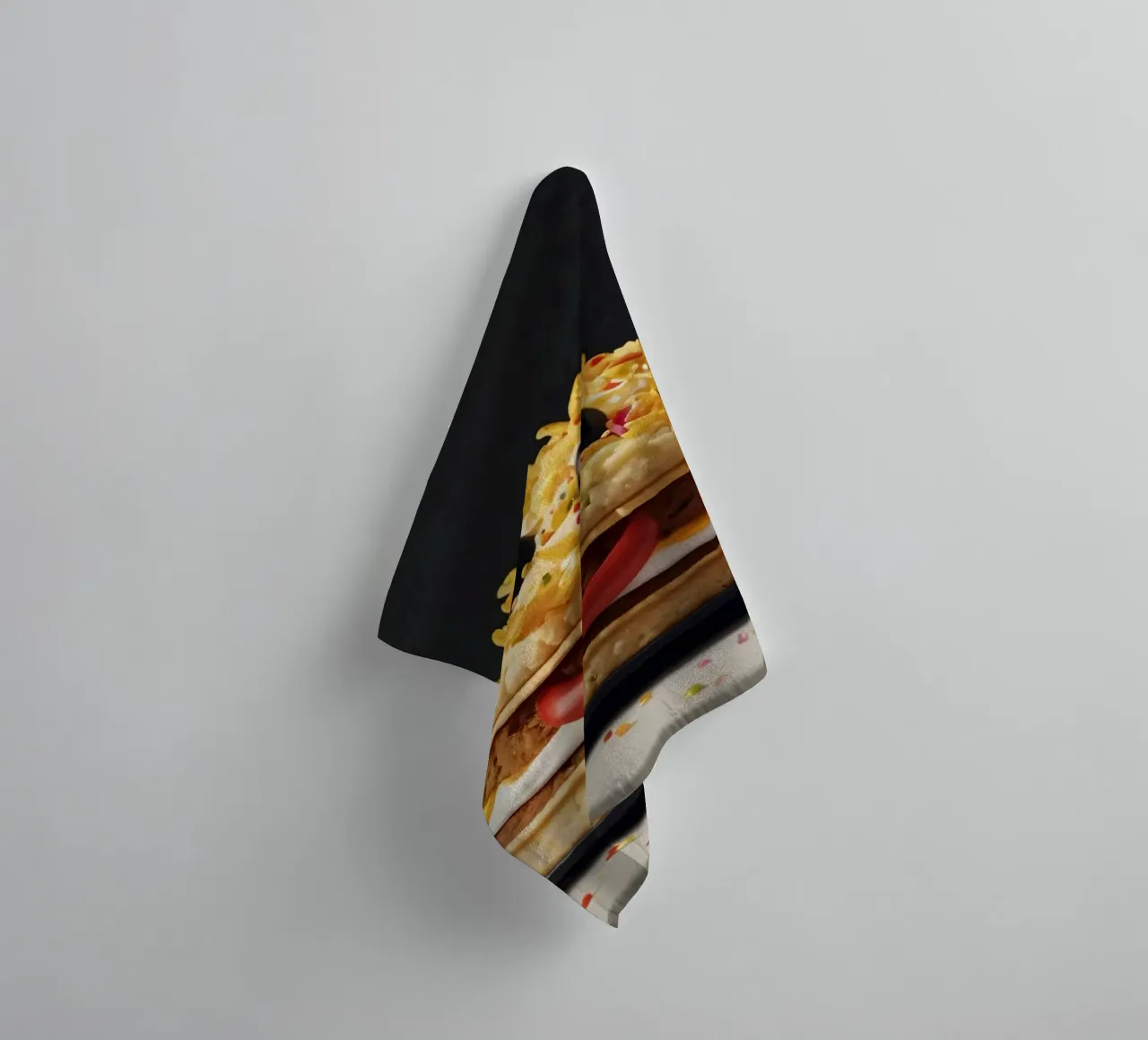 Fun and colorful dessert display featuring a playful burger towel by DesignDoodle