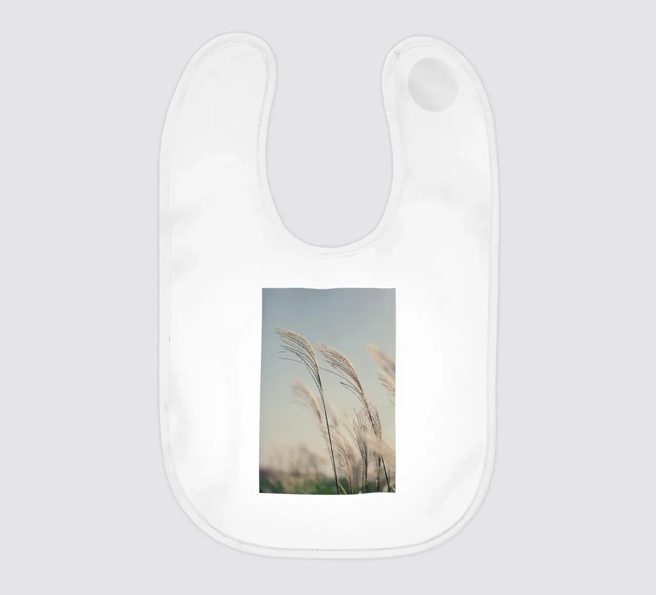 Blowing In The Breeze bavaglino da Flora & Fauna