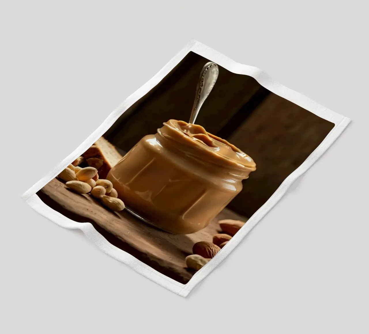 Delicious creamy peanut butter in a jar with sliced bread fleece blanket by DesignDoodle
