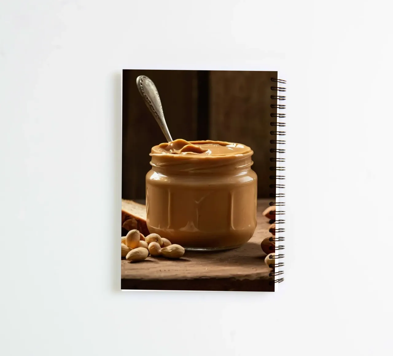 Delicious creamy peanut butter in a jar with sliced bread spiral notebook by DesignDoodle