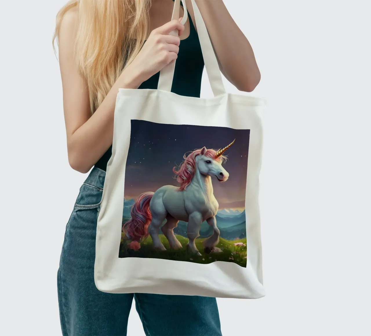 A majestic unicorn with a shimmering mane stands gracefully tote bag by DesignDoodle
