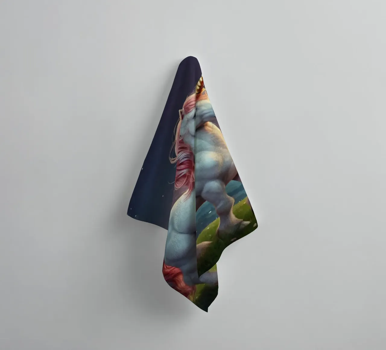 A majestic unicorn with a shimmering mane stands gracefully towel by DesignDoodle