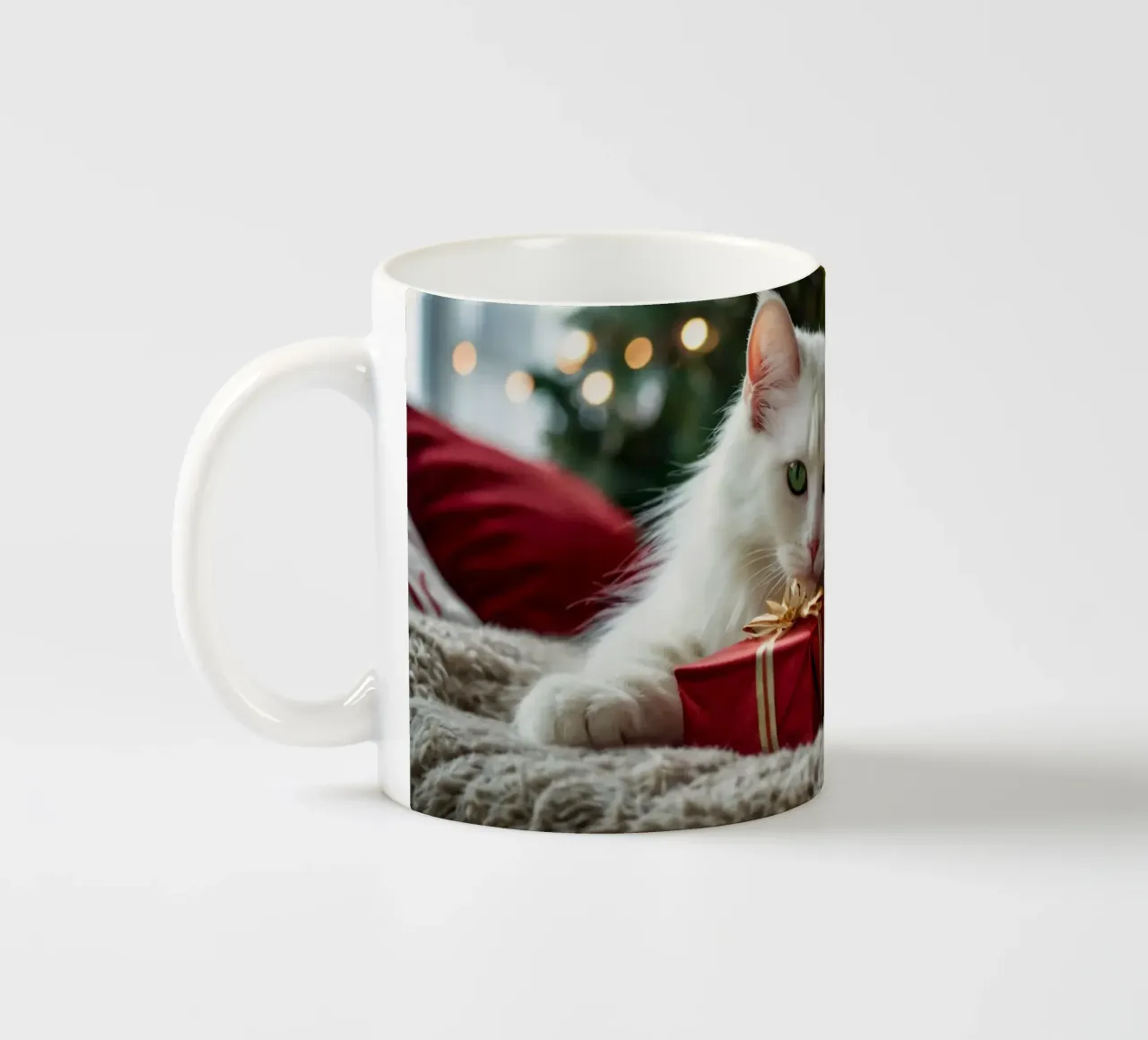 Two fluffy cats relaxing near a decorated Christmas tree ceramic mug by DesignDoodle