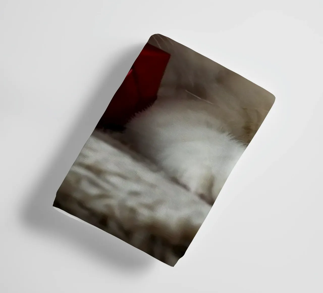 Two fluffy cats relaxing near a decorated Christmas tree towel by DesignDoodle