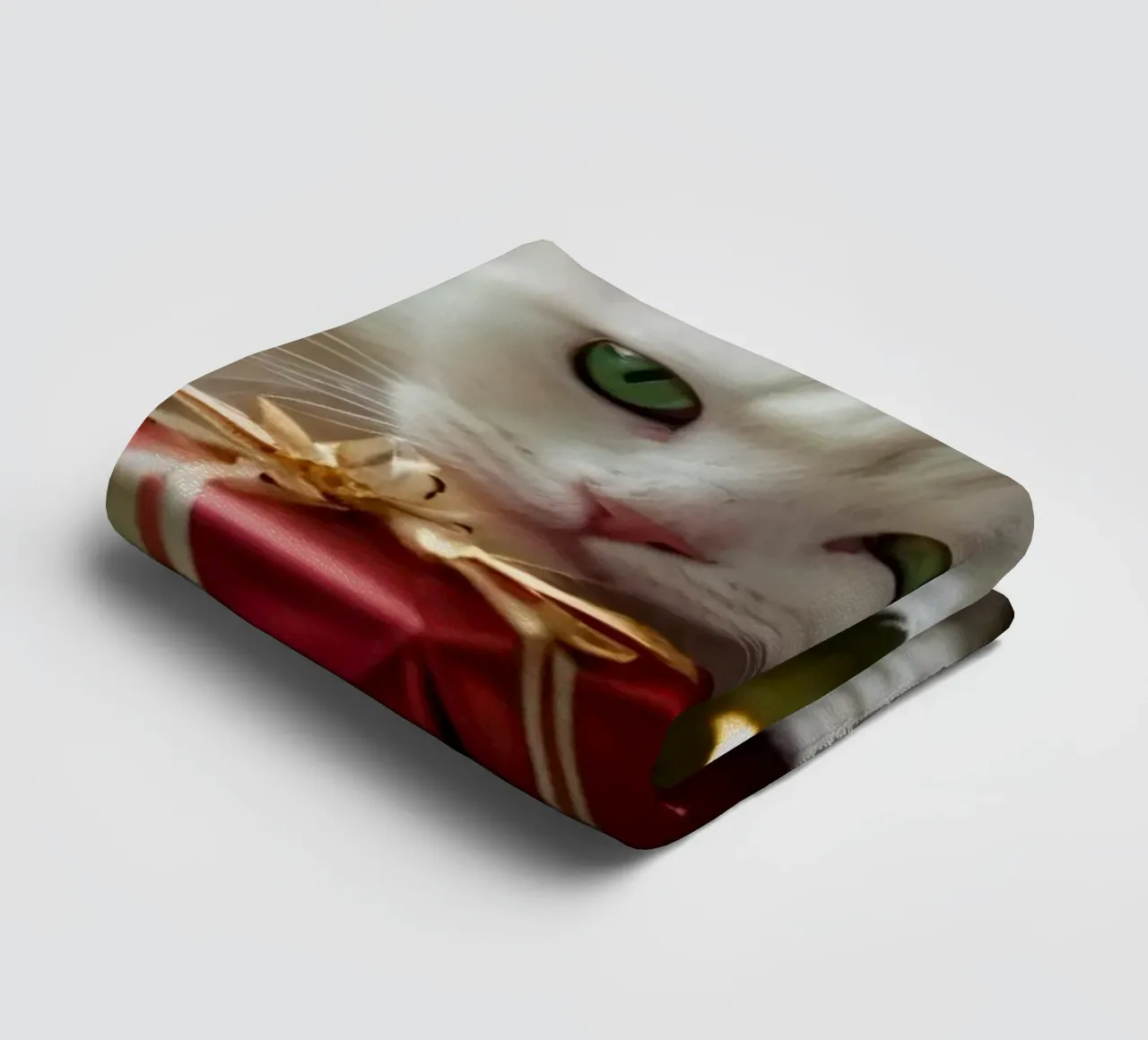 Two fluffy cats relaxing near a decorated Christmas tree towel by DesignDoodle