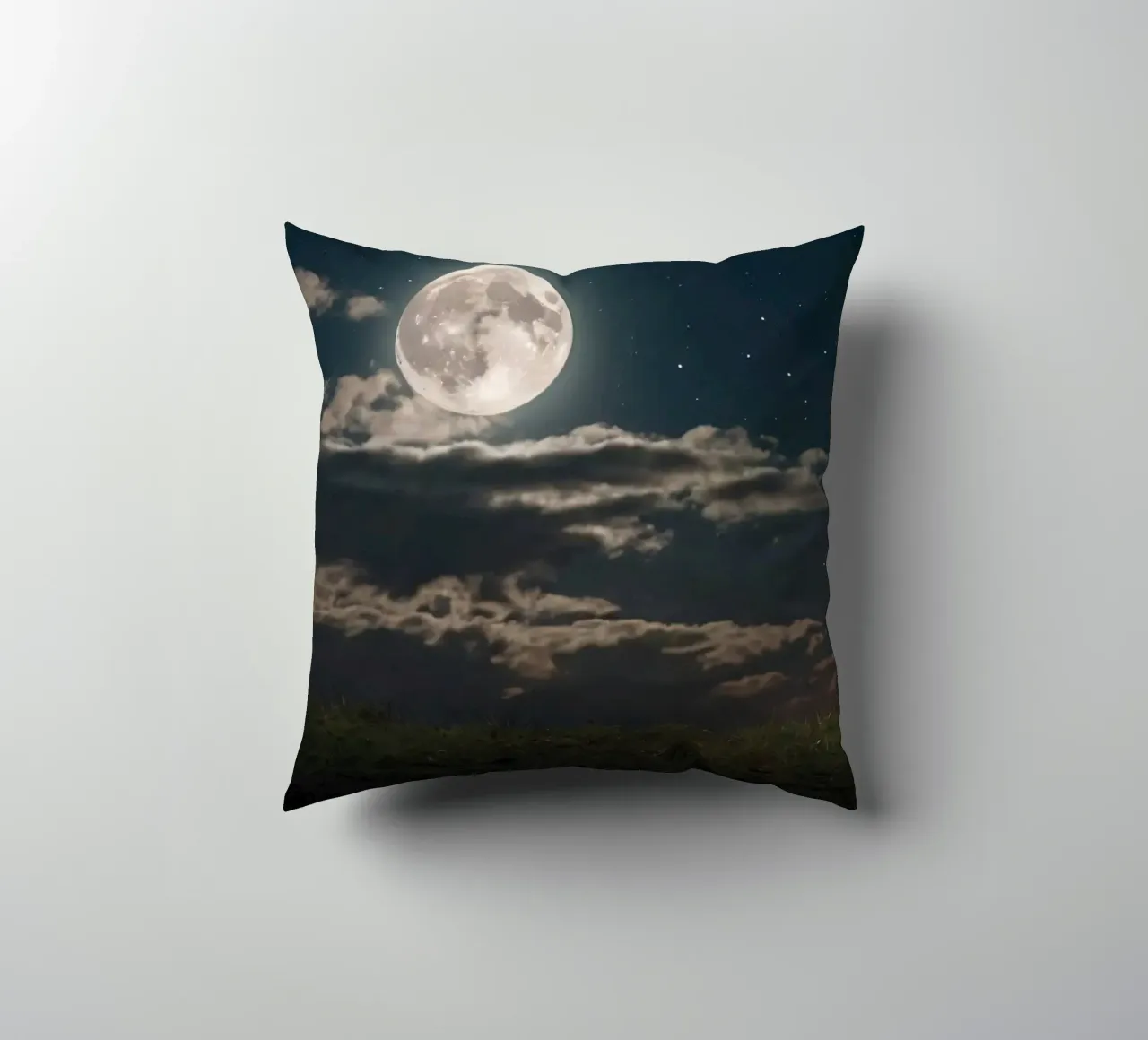 A lone sheep gazes at the bright full moon in a starlit sky decorative cushion by DesignDoodle