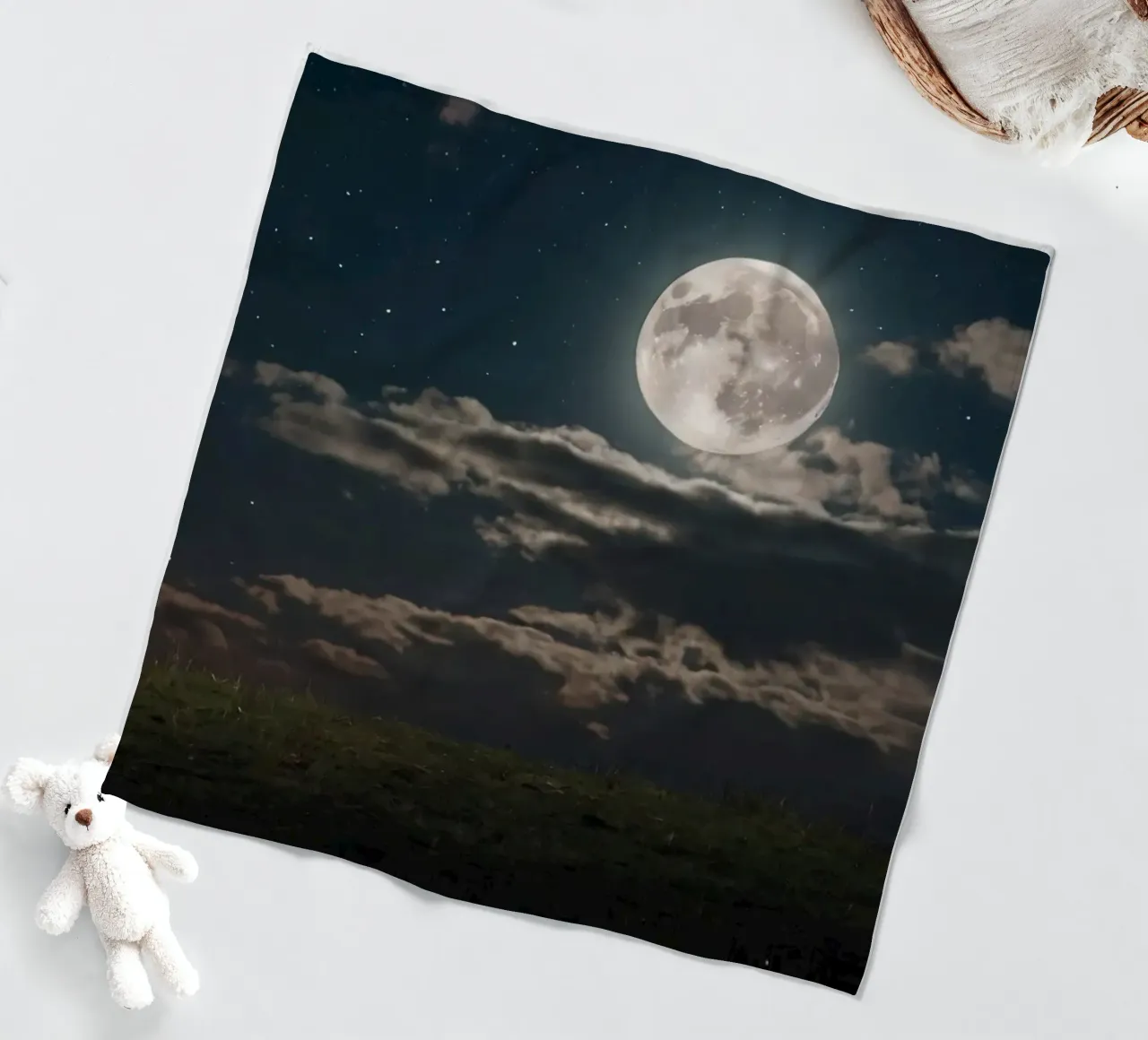 A lone sheep gazes at the bright full moon in a starlit sky fleece blanket by DesignDoodle
