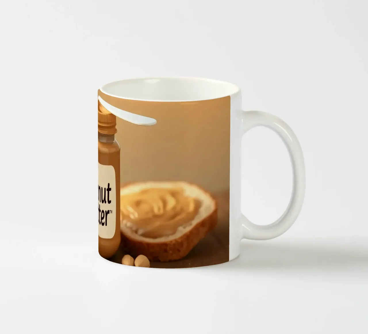 Delicious peanut butter jar with a spoon & slices of bread ceramic mug by DesignDoodle