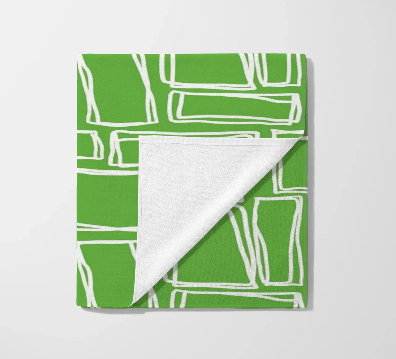 Quadrati Doodle in verde fresco telo mare da Happy Littles