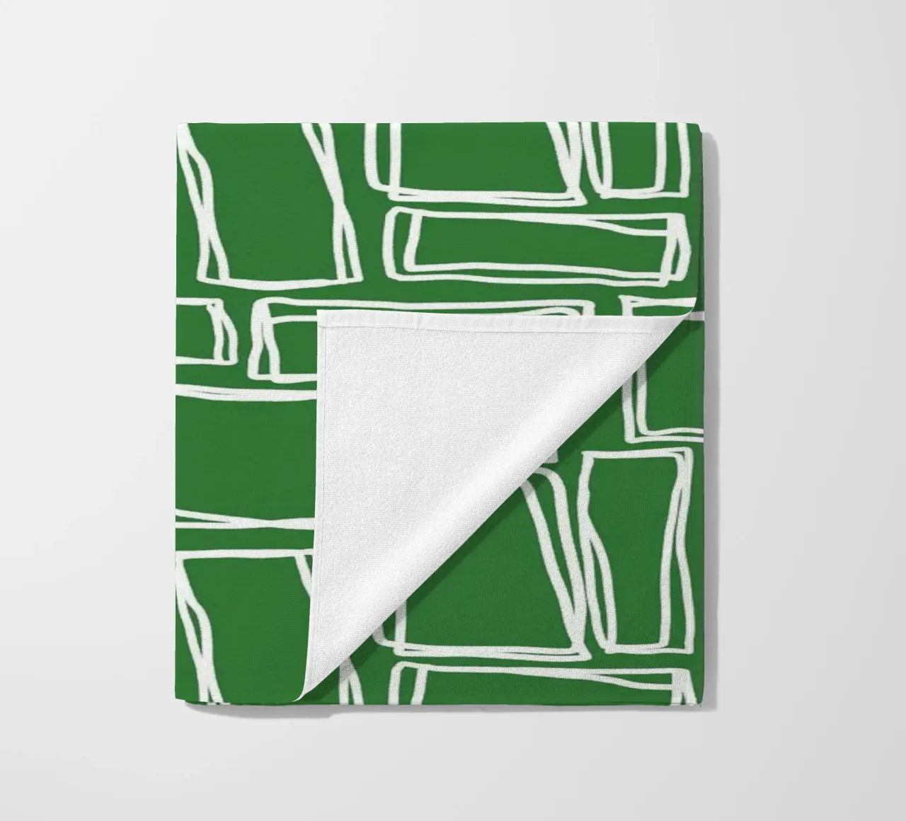 Quadrati Doodle in verde bosco telo mare da Happy Littles