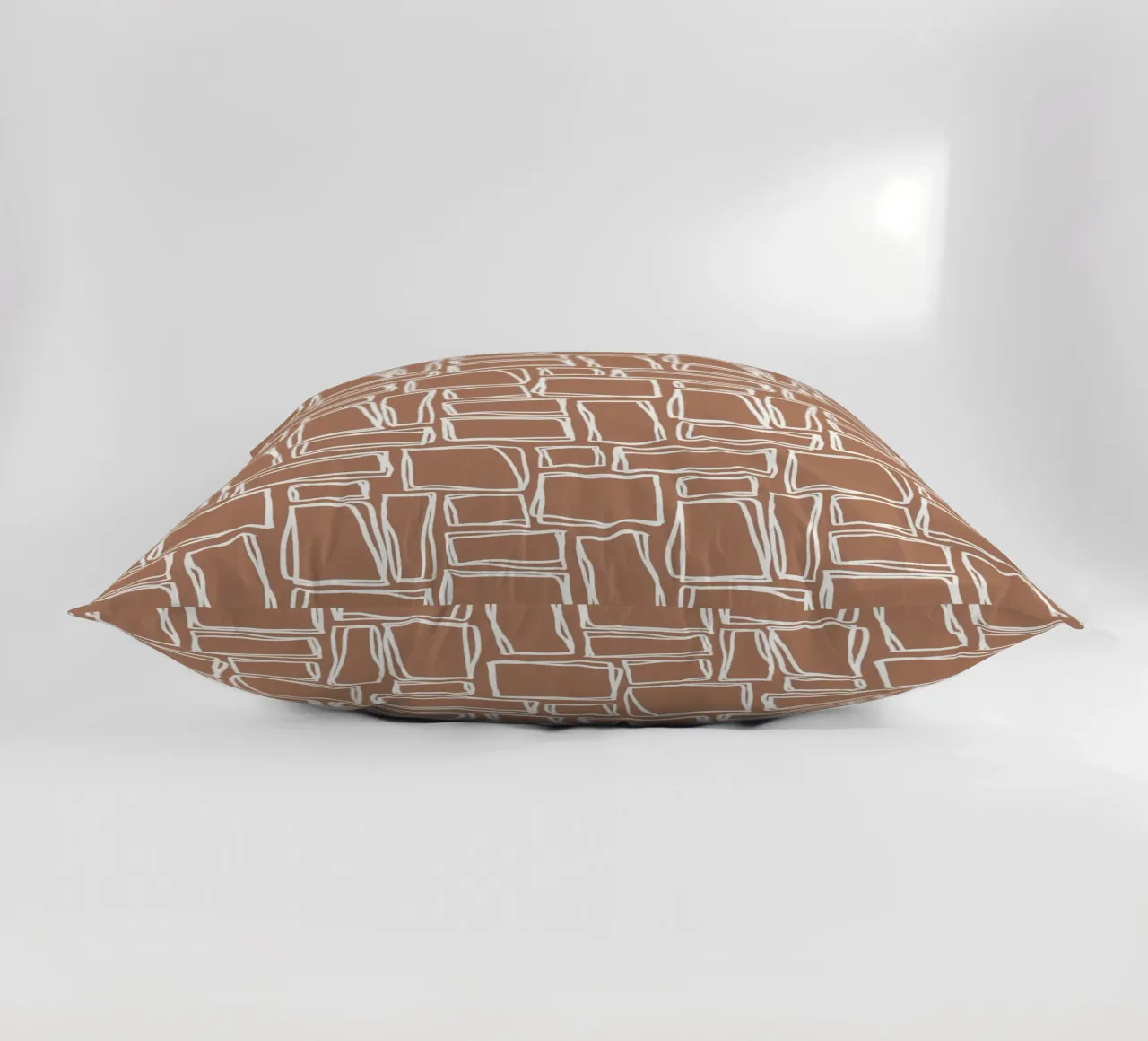Quadrati Doodle in marrone argilla cuscino da Happy Littles