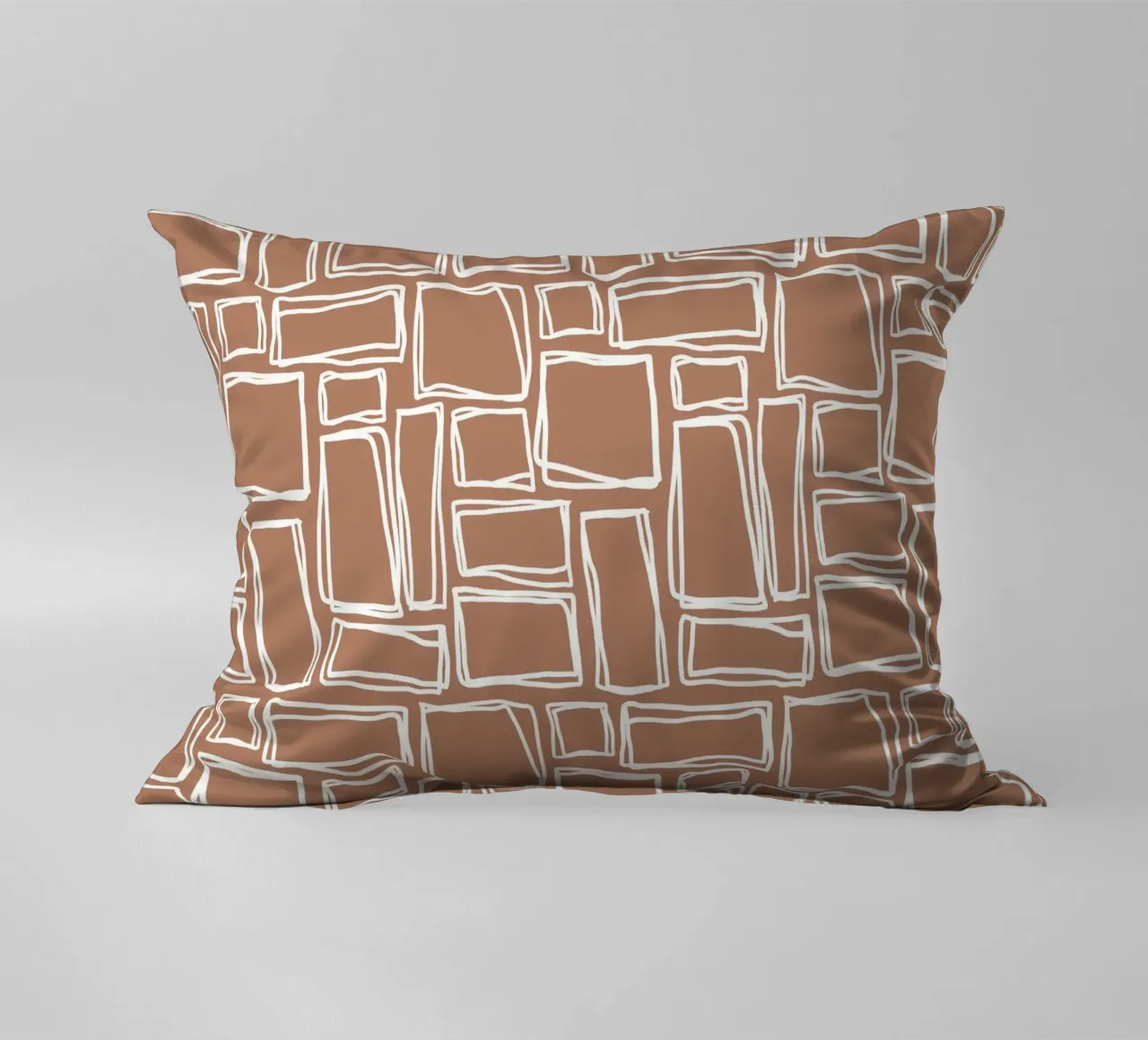 Quadrati Doodle in marrone argilla cuscino da Happy Littles