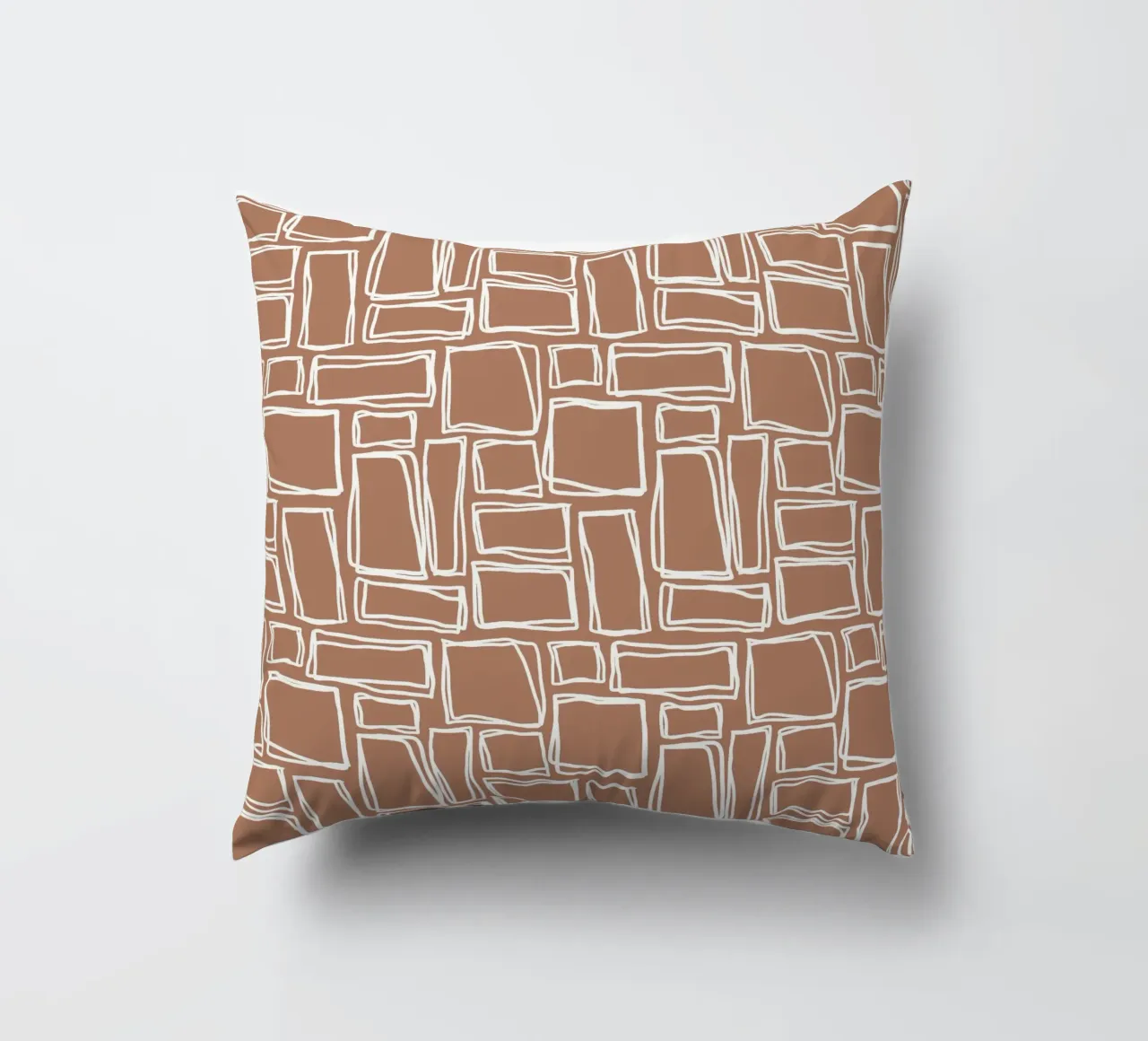 Quadrati Doodle in marrone argilla cuscino da Happy Littles