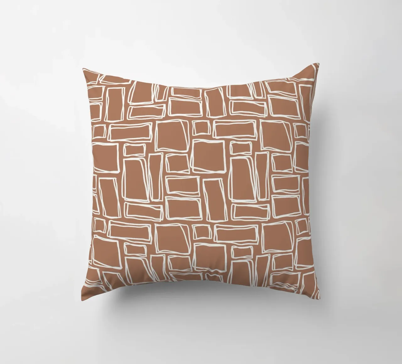 Quadrati Doodle in marrone argilla cuscino da Happy Littles