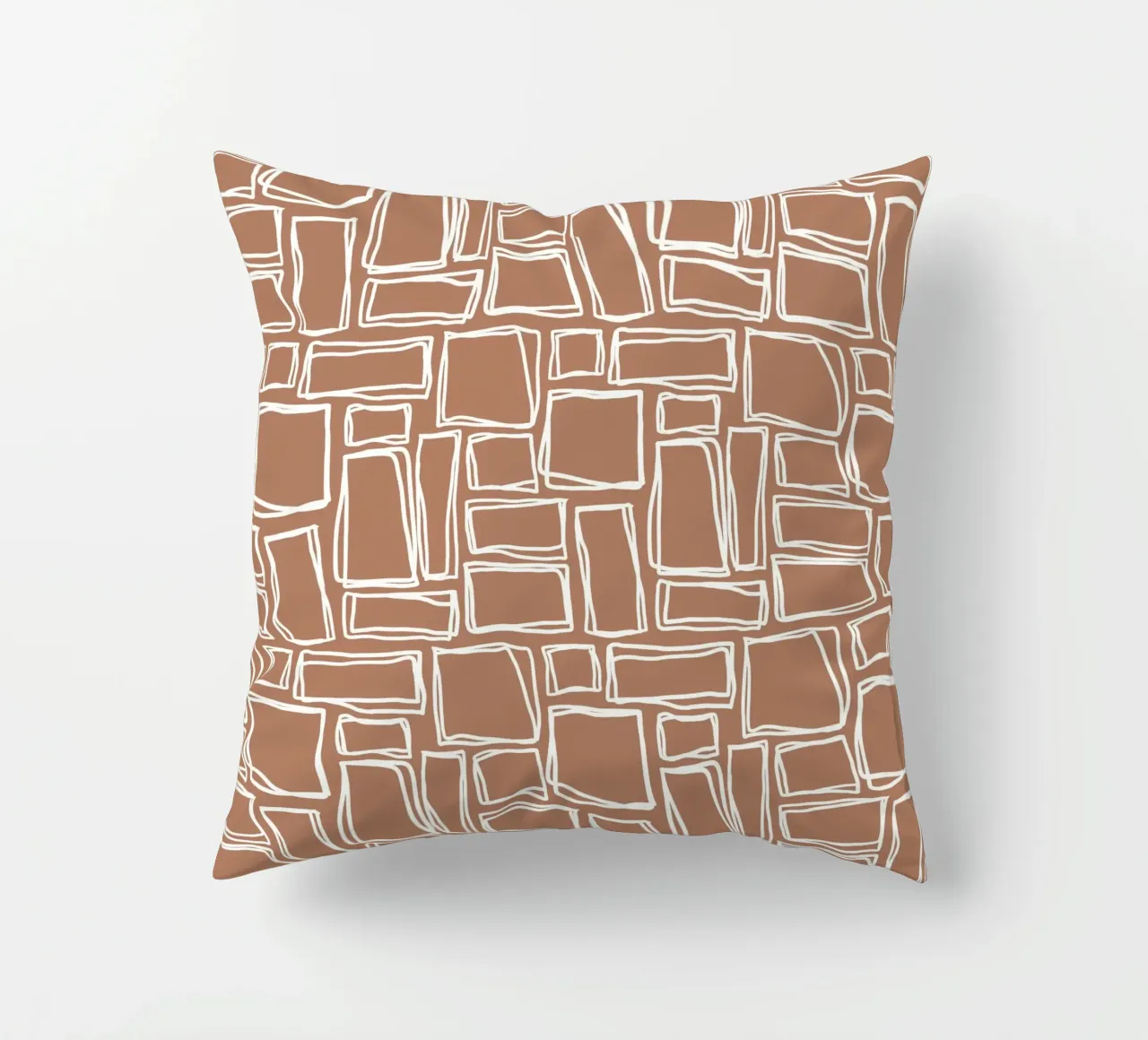 Quadrati Doodle in marrone argilla cuscino da Happy Littles