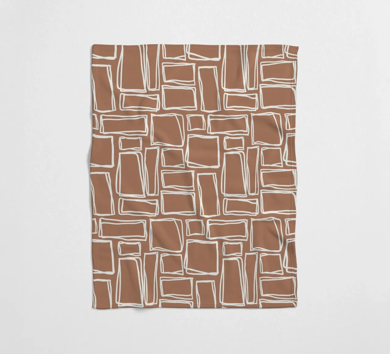 Quadrati Doodle in marrone argilla coperta in pile da Happy Littles