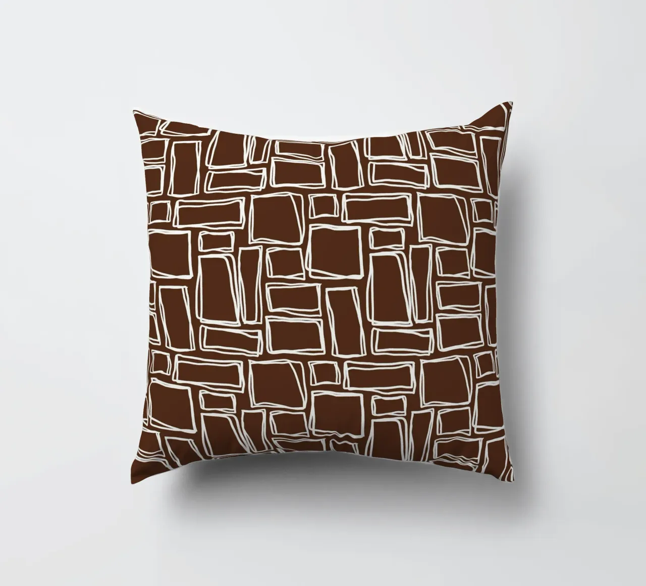 Quadrati Doodle in marrone cacao cuscino da Happy Littles