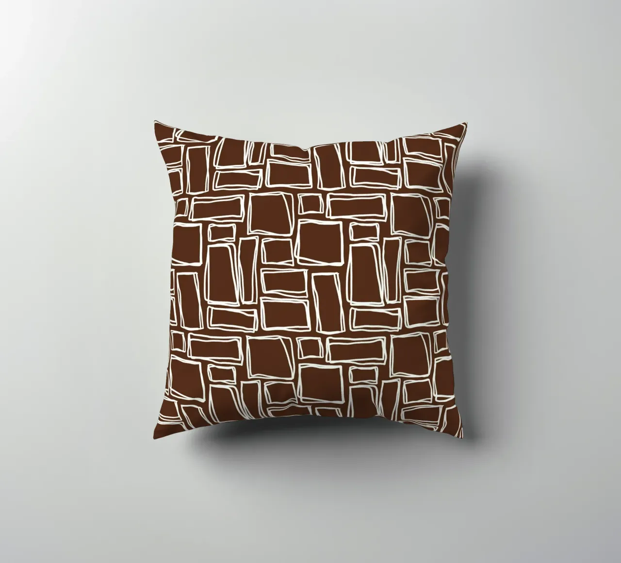 Quadrati Doodle in marrone cacao cuscino da Happy Littles