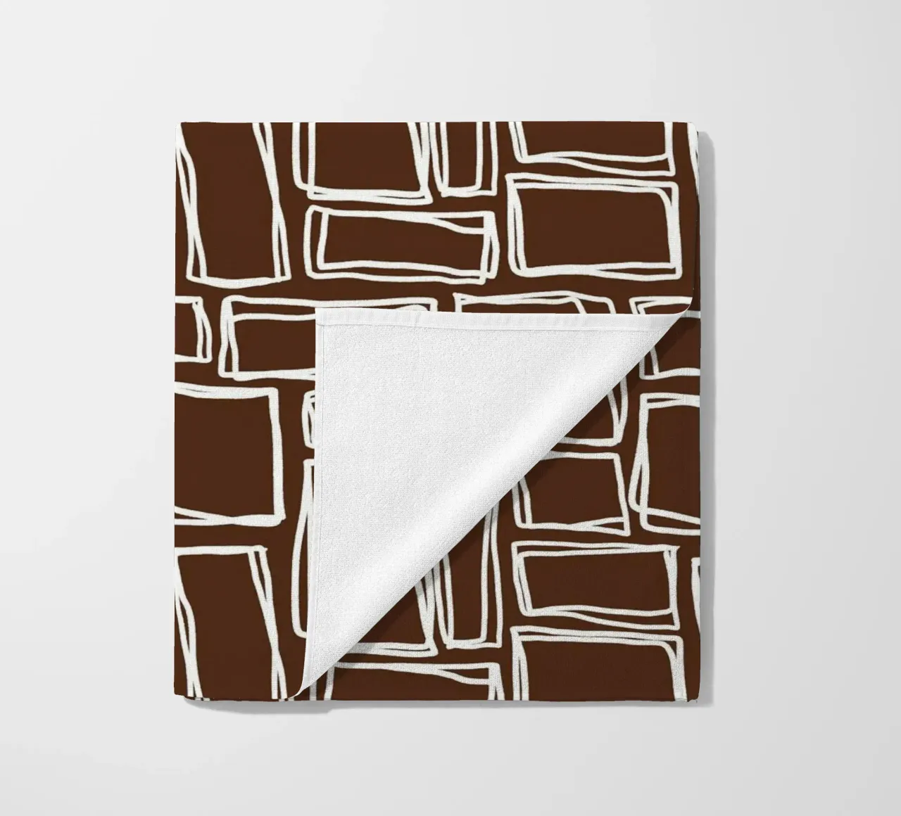 Quadrati Doodle in marrone cacao telo mare da Happy Littles