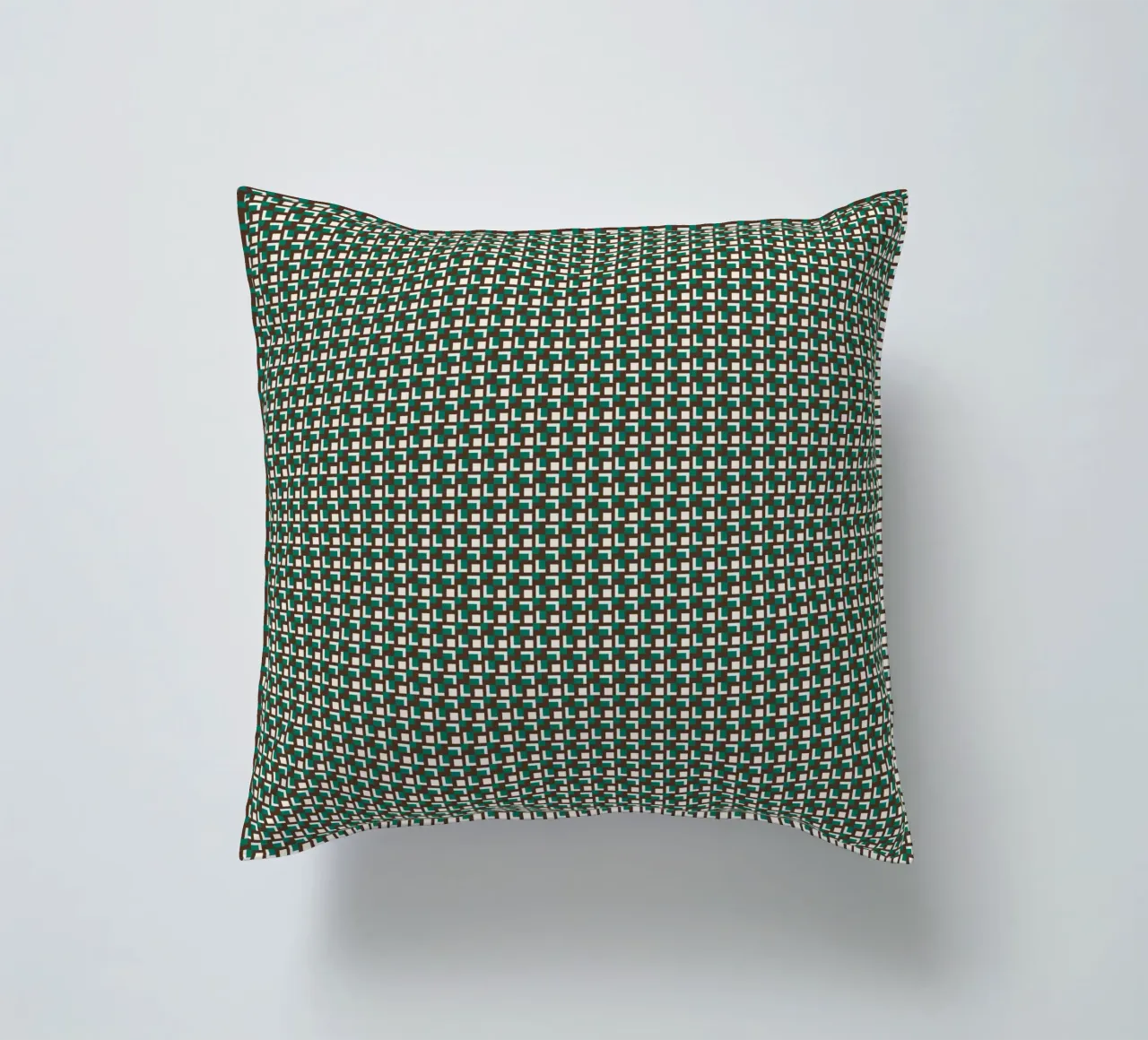 Interlocking grid pattern decorative cushion by Little Dean