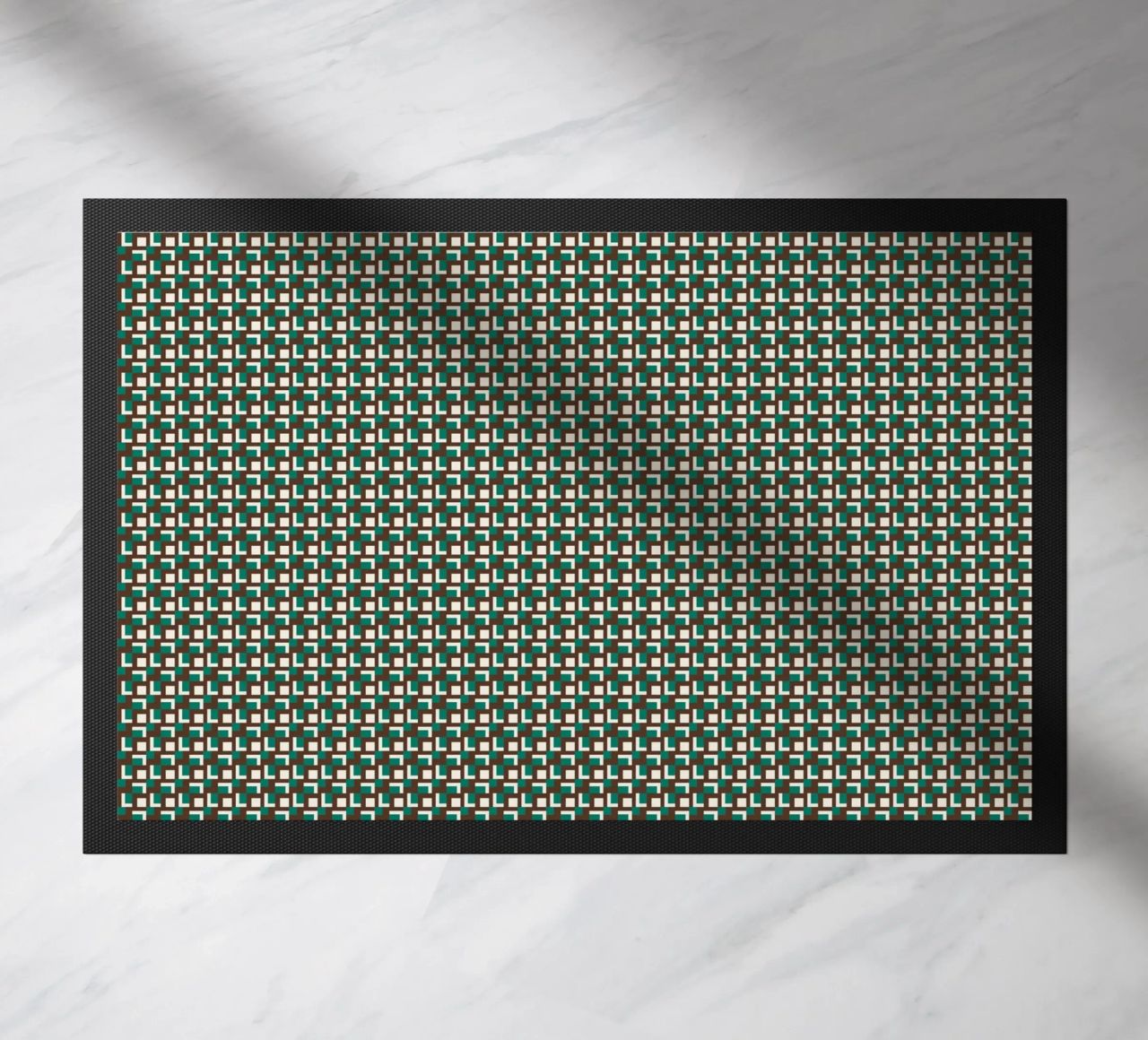Interlocking grid pattern doormat by Little Dean