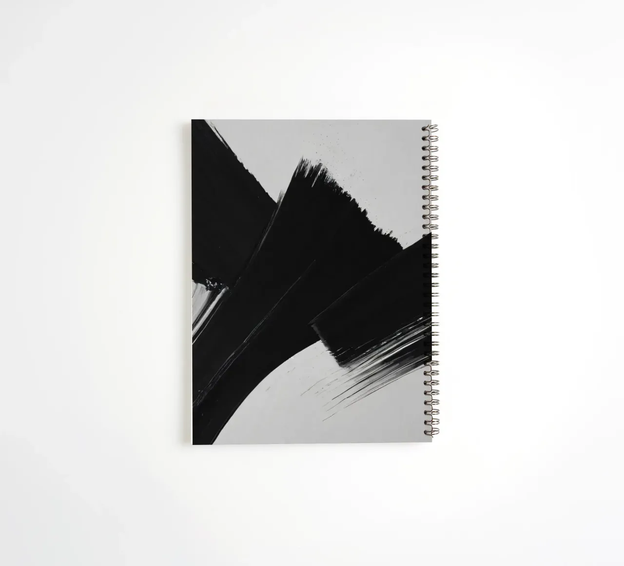 Abstract black and white brush strokes creating dynamic move spiral notebook by DesignDoodle