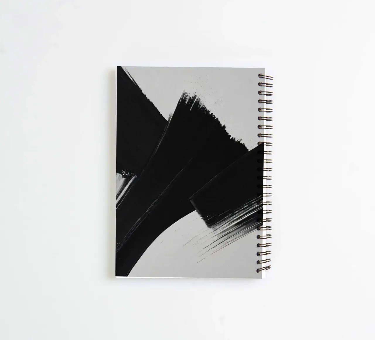 Abstract black and white brush strokes creating dynamic move spiral notebook by DesignDoodle