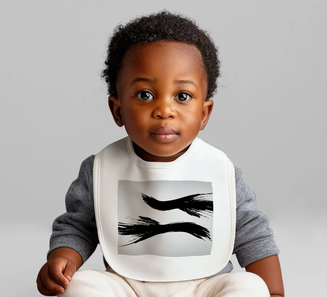 Abstract black and white brush strokes creating dynamic move baby bib by DesignDoodle