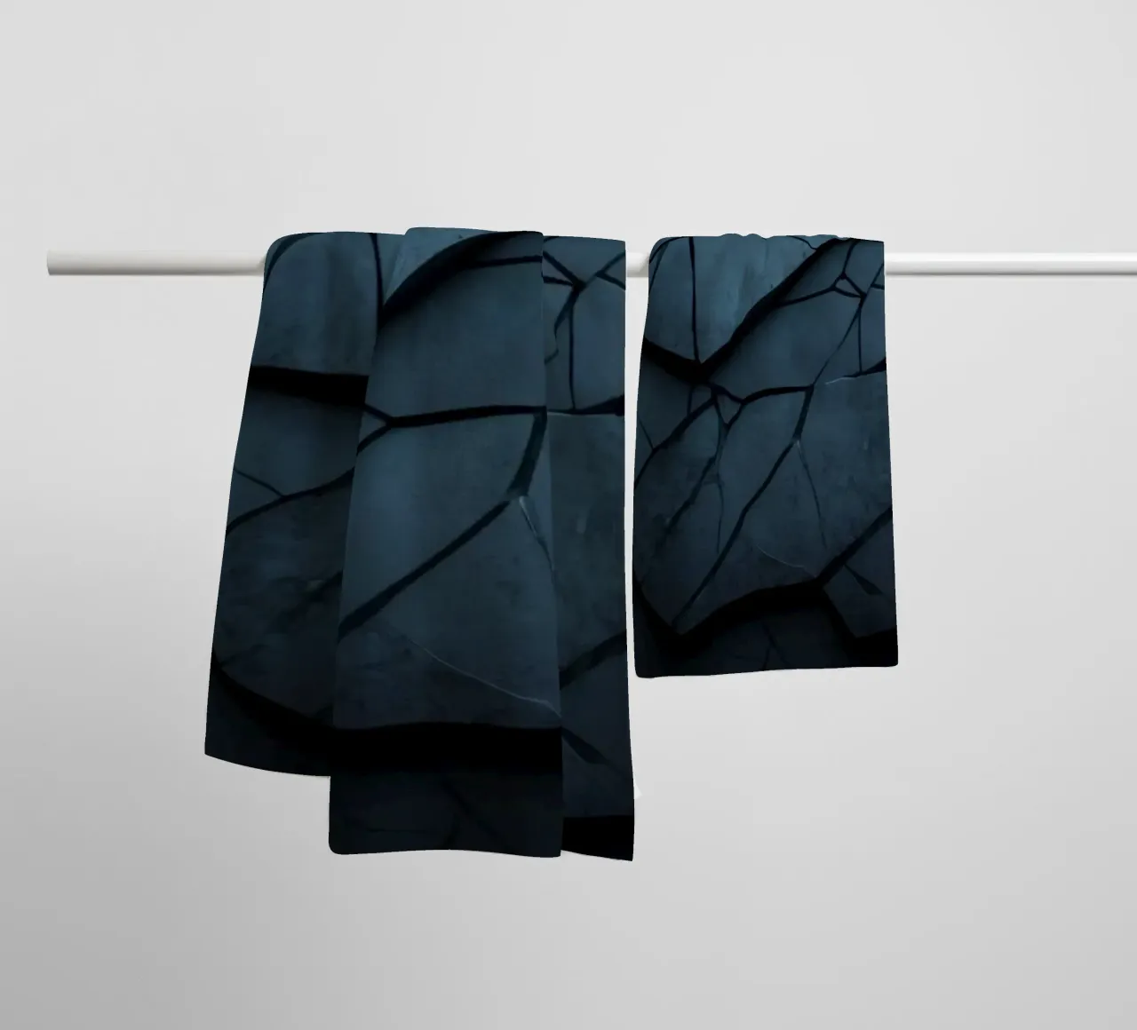 Dark cracked stone texture creates an abstract background towel by DesignDoodle