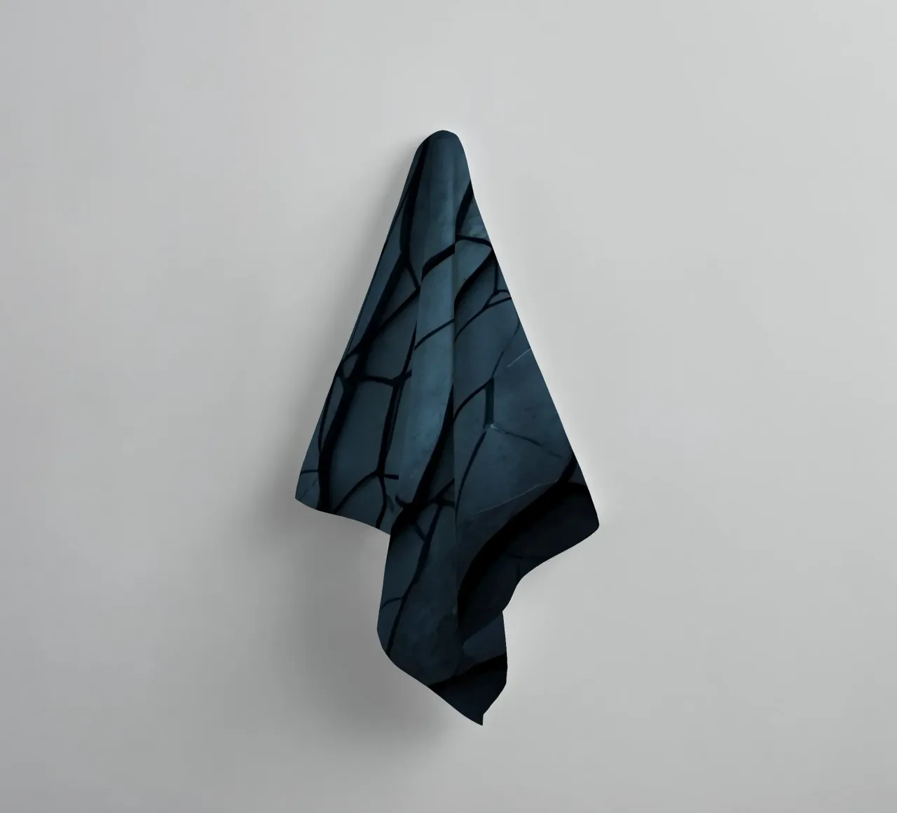 Dark cracked stone texture creates an abstract background towel by DesignDoodle