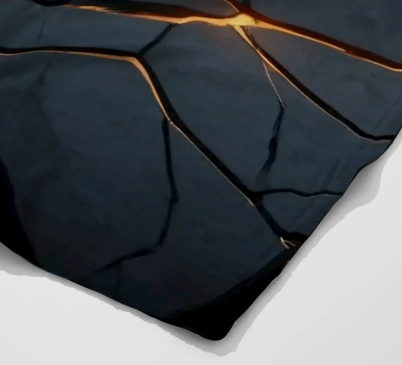 cracks in a dark surface create an intriguing abstract back fleece blanket by DesignDoodle