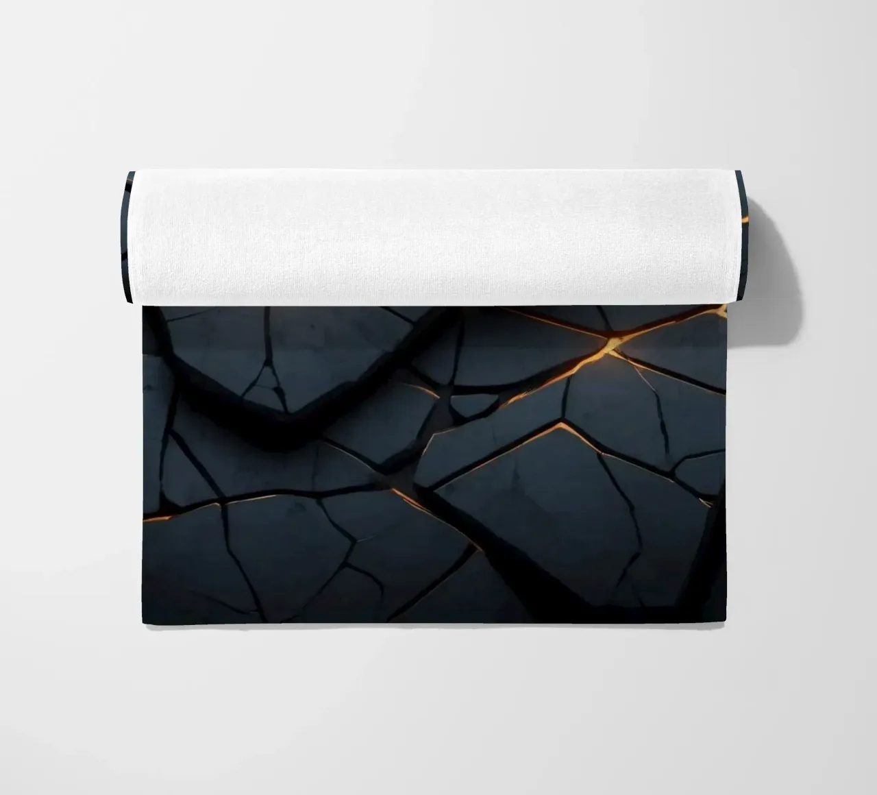 cracks in a dark surface create an intriguing abstract back beach towel by DesignDoodle