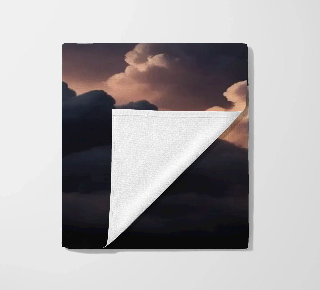 cloud formation creates a stunning abstract background beach towel by DesignDoodle