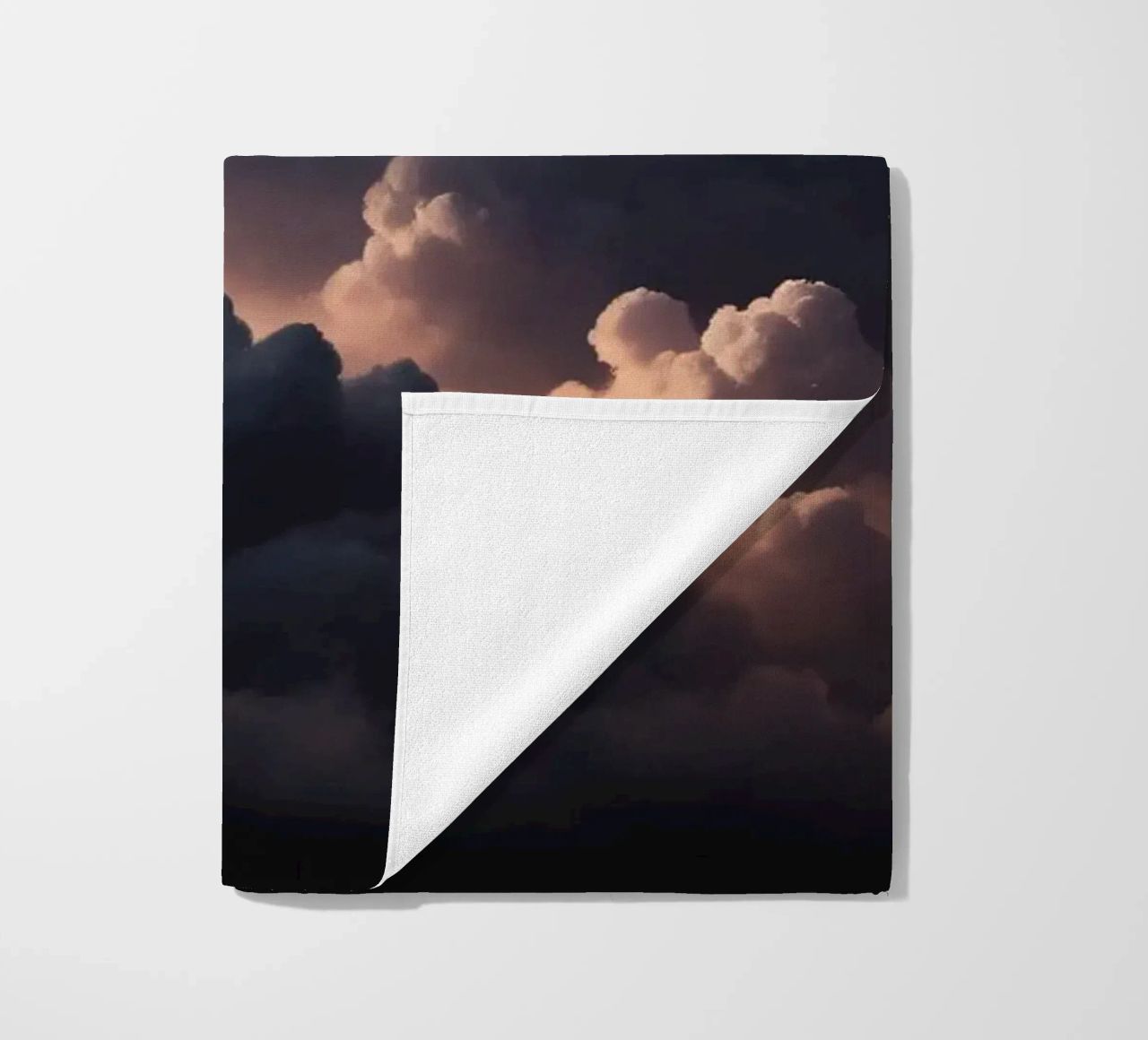 cloud formation creates a stunning abstract background beach towel by DesignDoodle