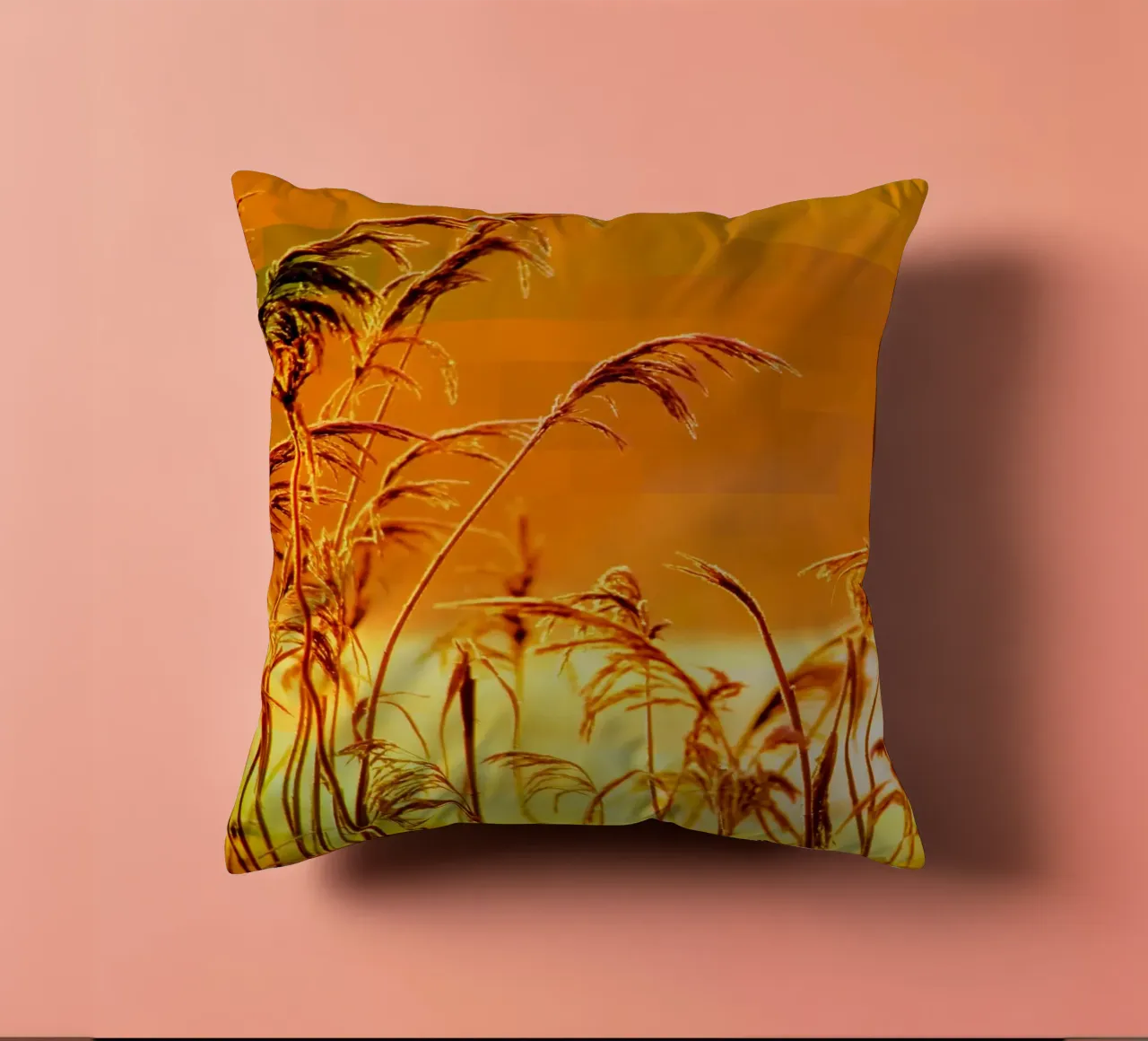 Golden reeds against an orange rectangular background decorative cushion by Something for you