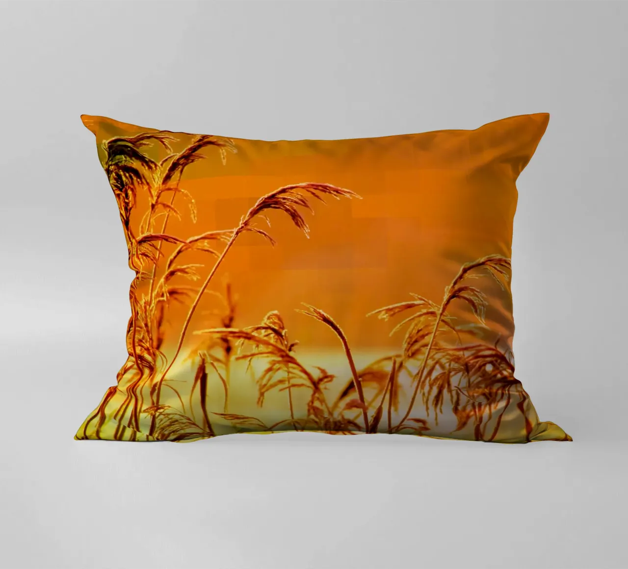 Golden reeds against an orange rectangular background decorative cushion by Something for you