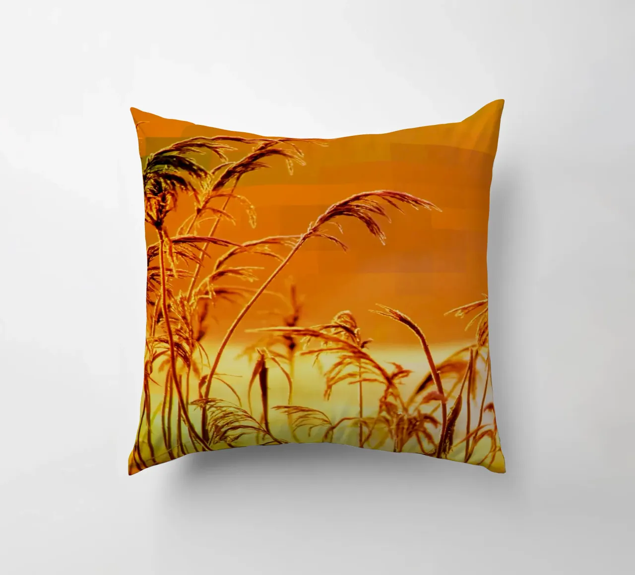 Golden reeds against an orange rectangular background decorative cushion by Something for you