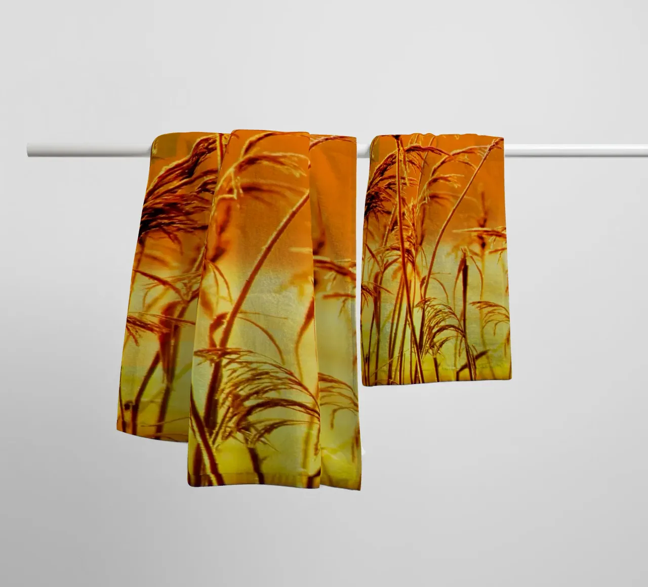 Golden reeds against an orange rectangular background towel by Something for you