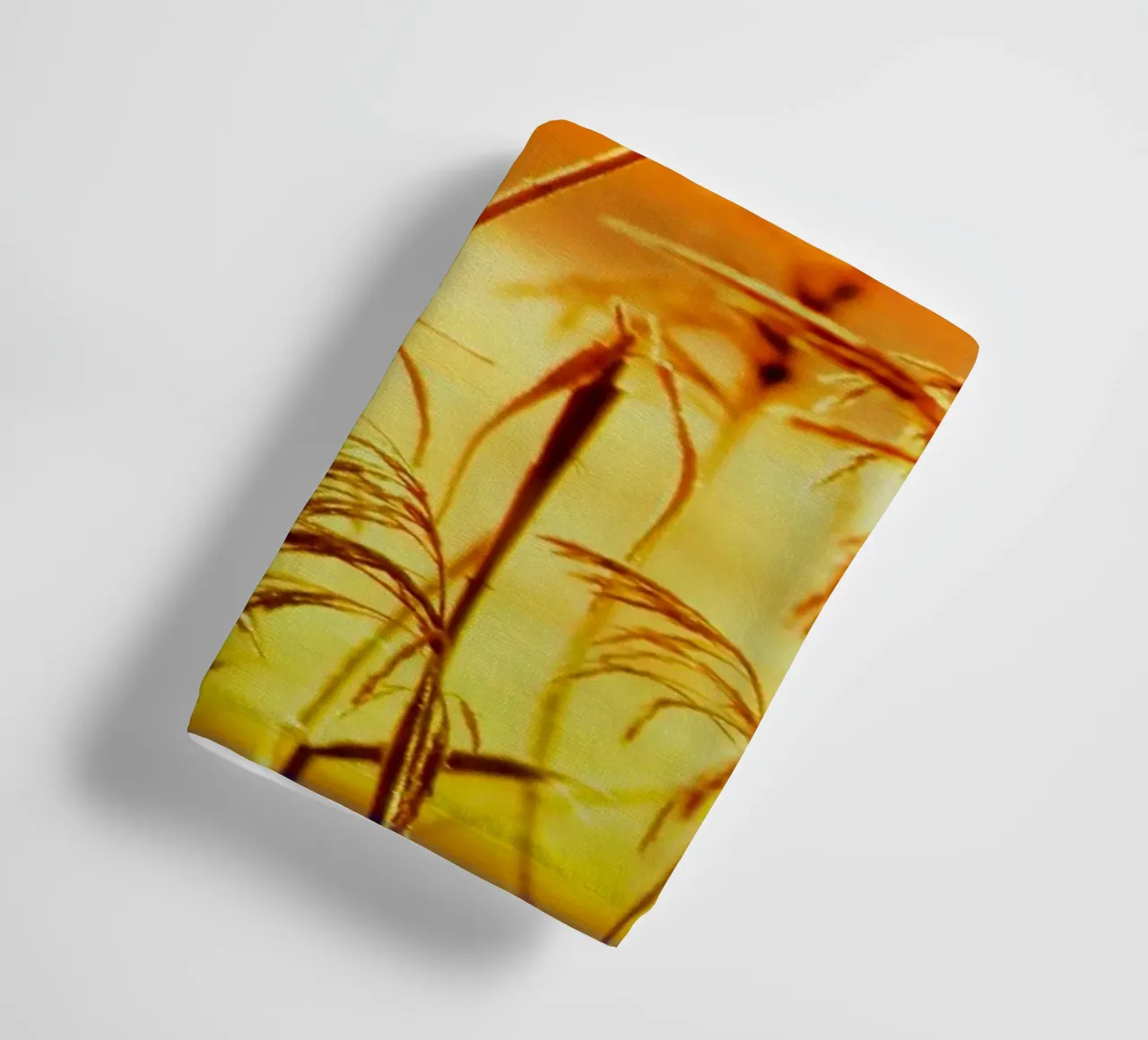 Golden reeds against an orange rectangular background towel by Something for you