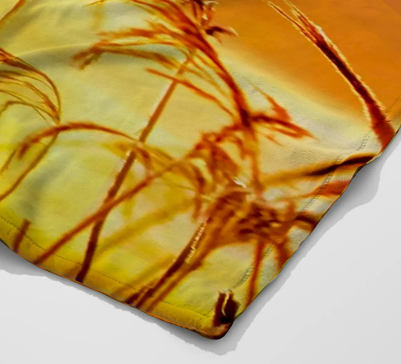 Golden reeds against an orange rectangular background fleece blanket by Something for you