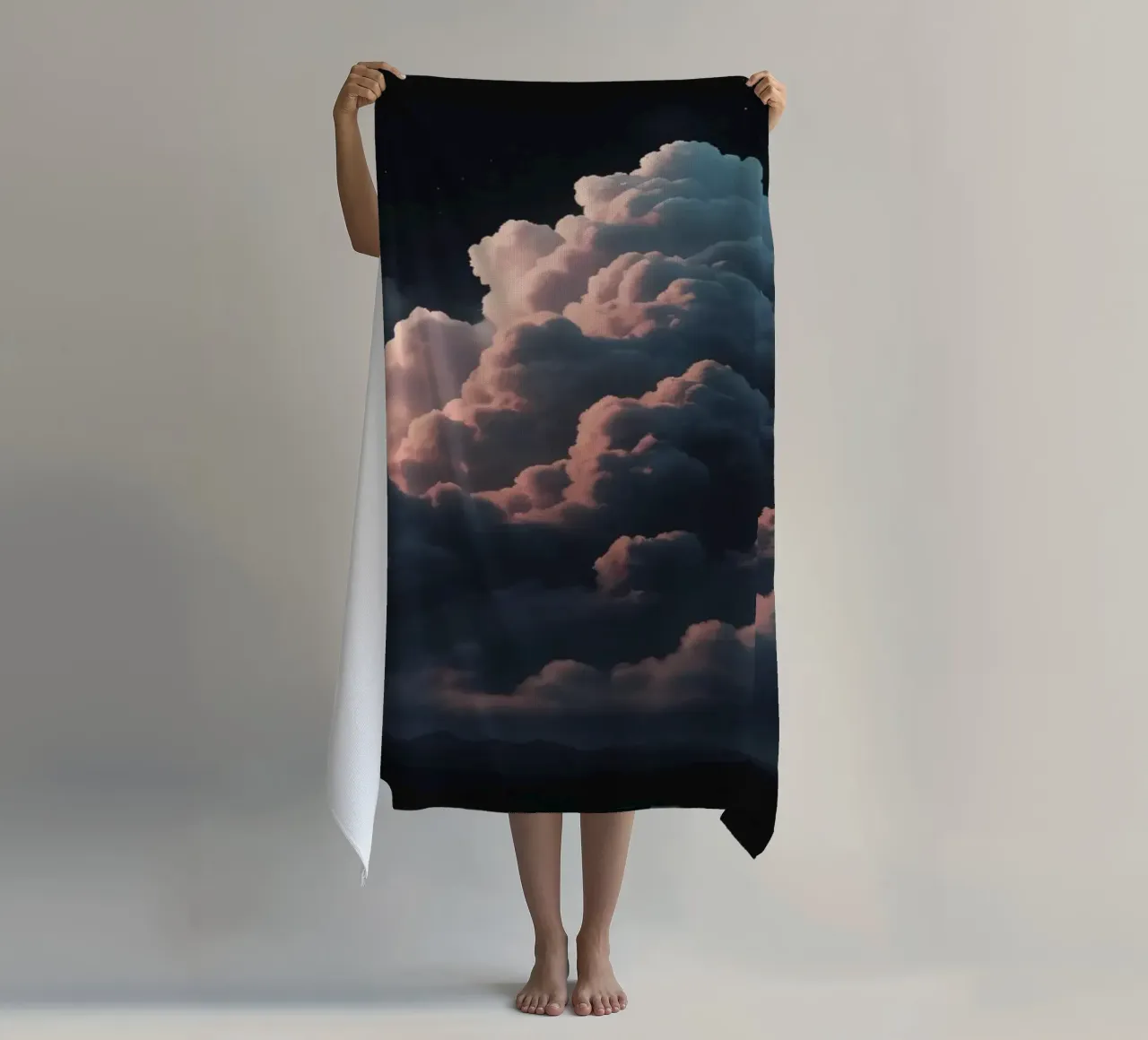 clouds illuminated by soft light create abstract art beach towel by DesignDoodle