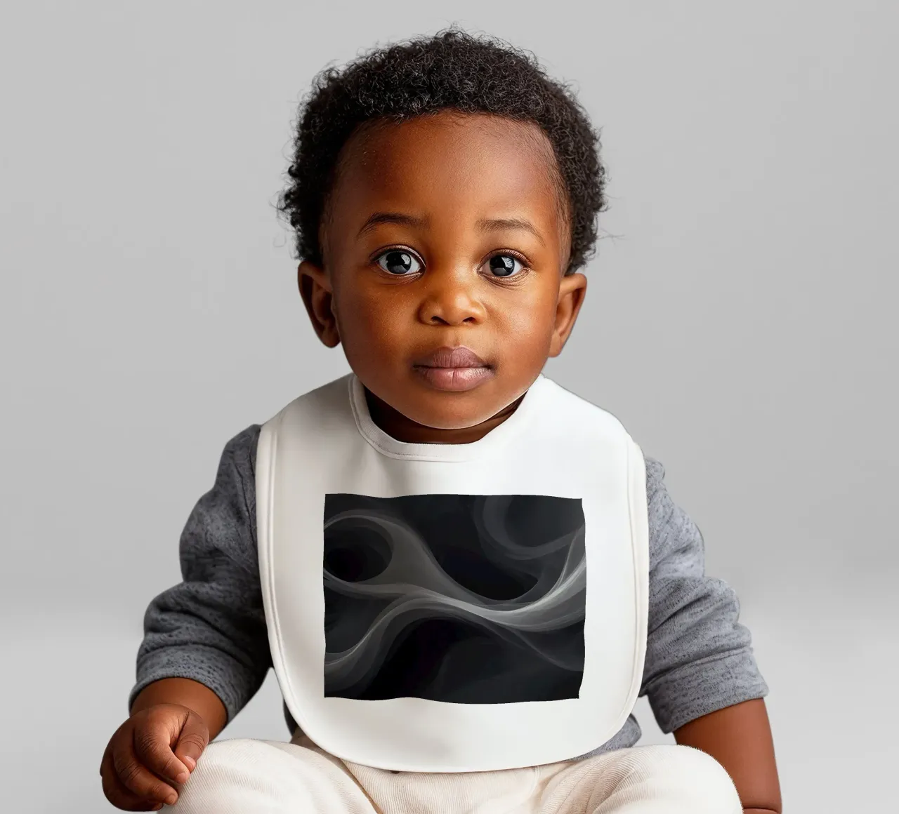 Dynamic swirls of smoke create an abstract background for mo baby bib by DesignDoodle