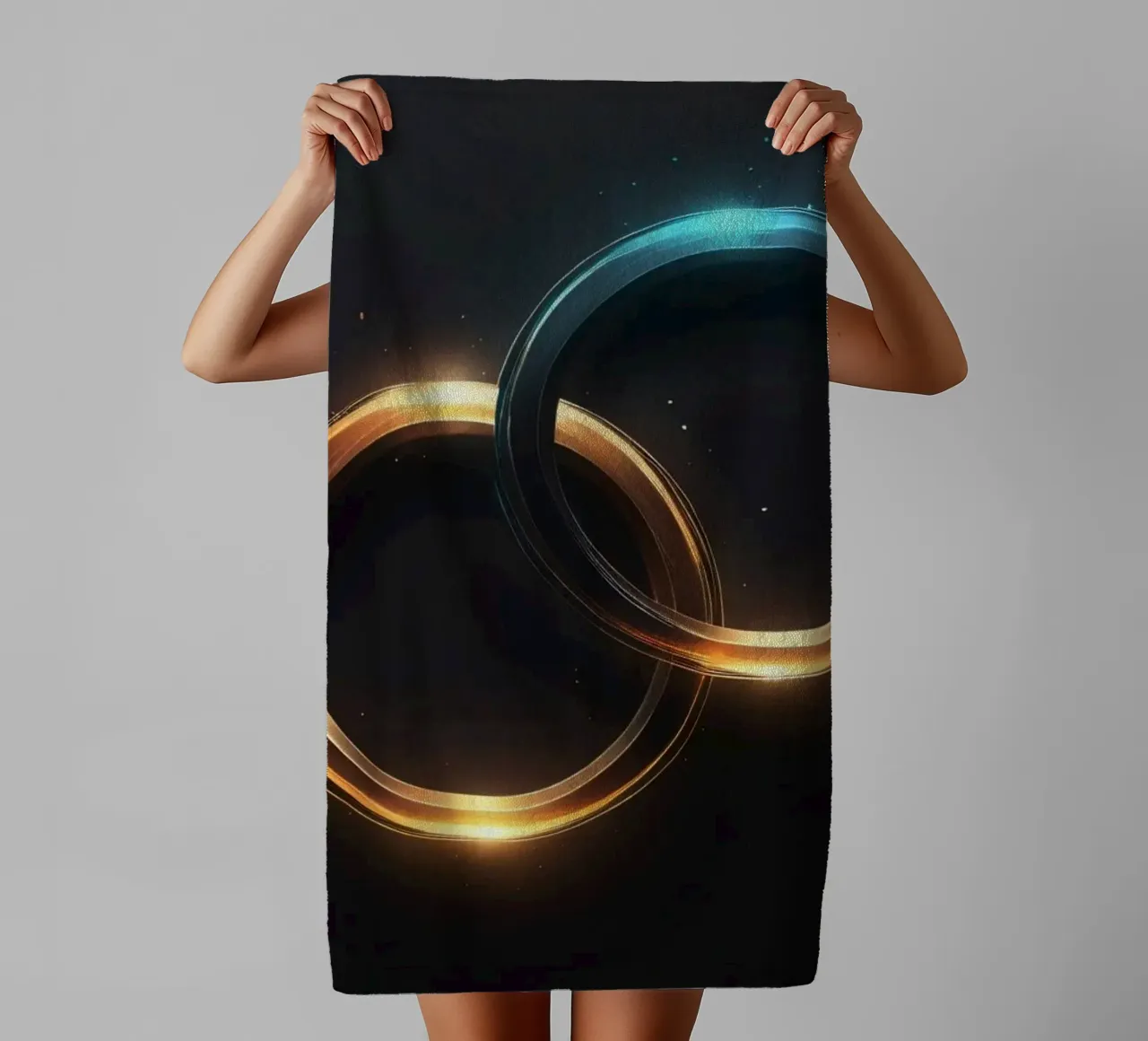 Swirling rings of light create a mesmerizing abstract art towel by DesignDoodle