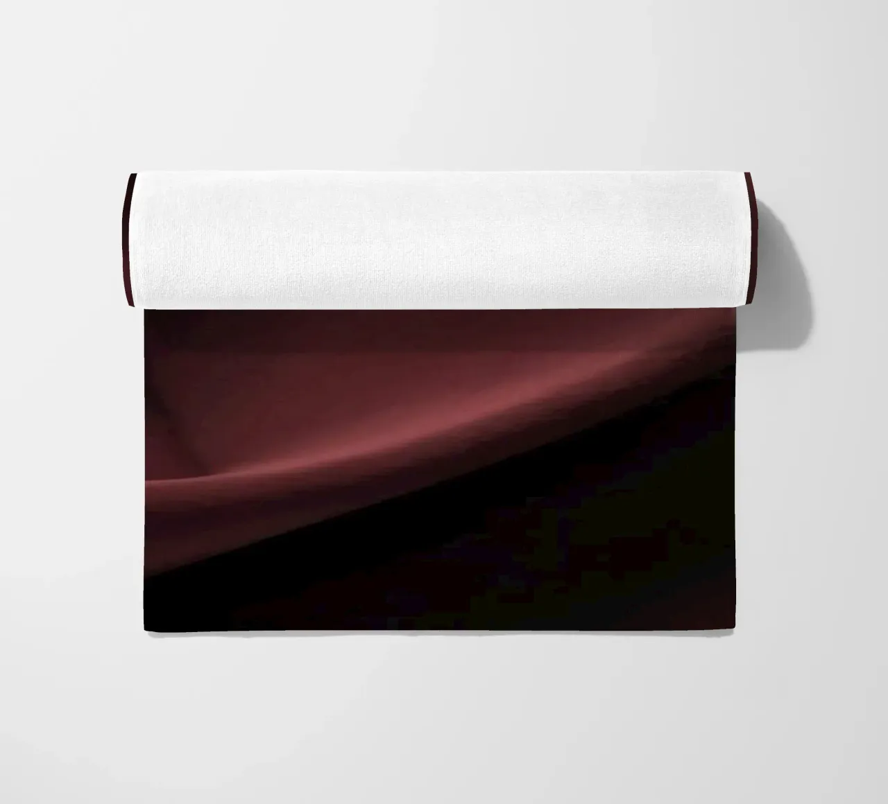 Elegant abstract background featuring smooth, flowing maroon beach towel by DesignDoodle