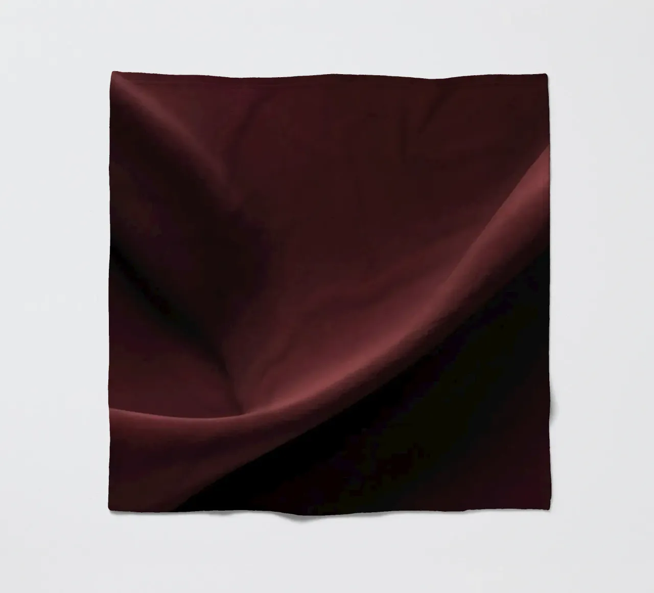 Elegant abstract background featuring smooth, flowing maroon fleece blanket by DesignDoodle