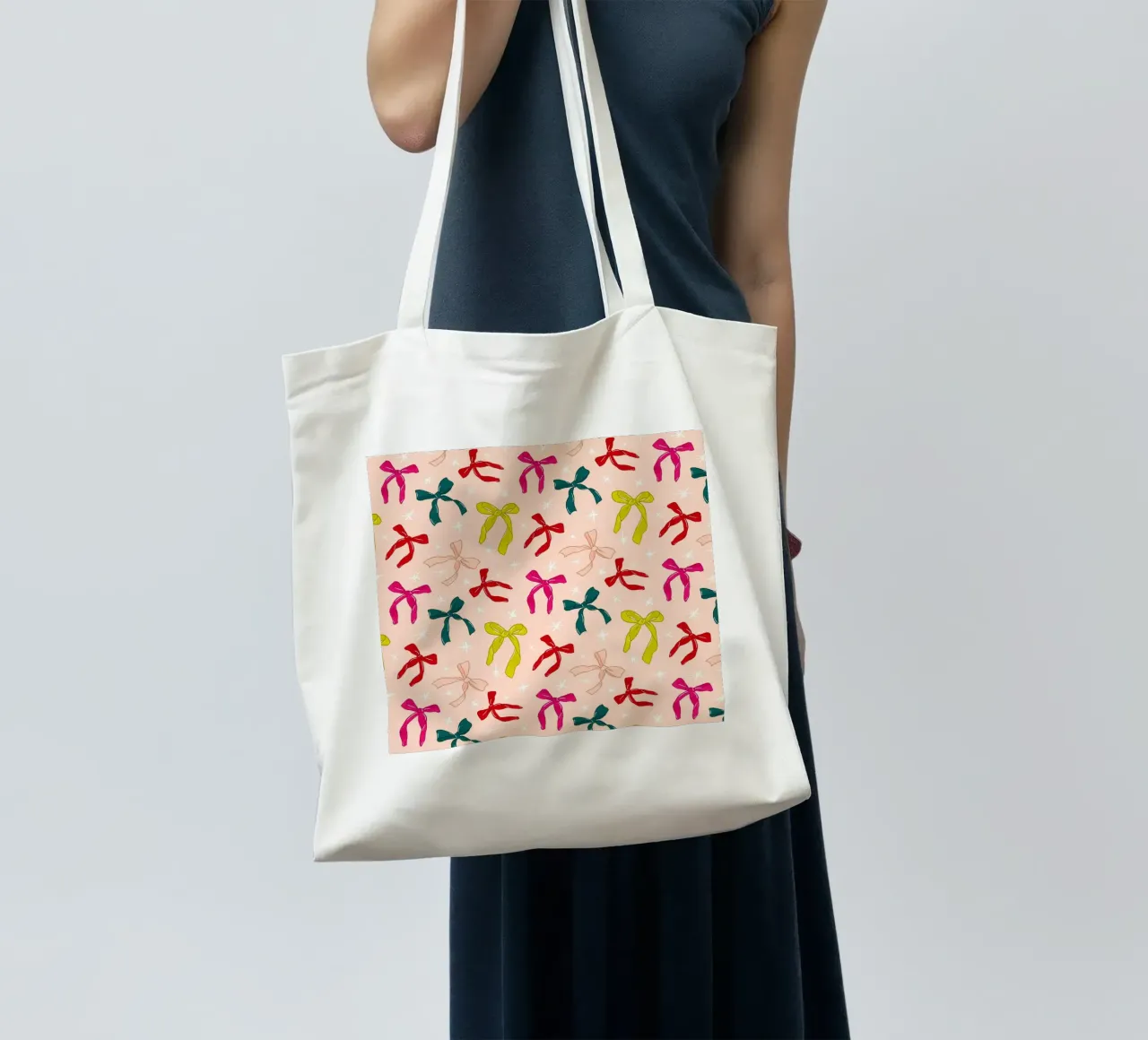Colorful Bows Pattern on Soft Peach Background borsa in juta da showmemars
