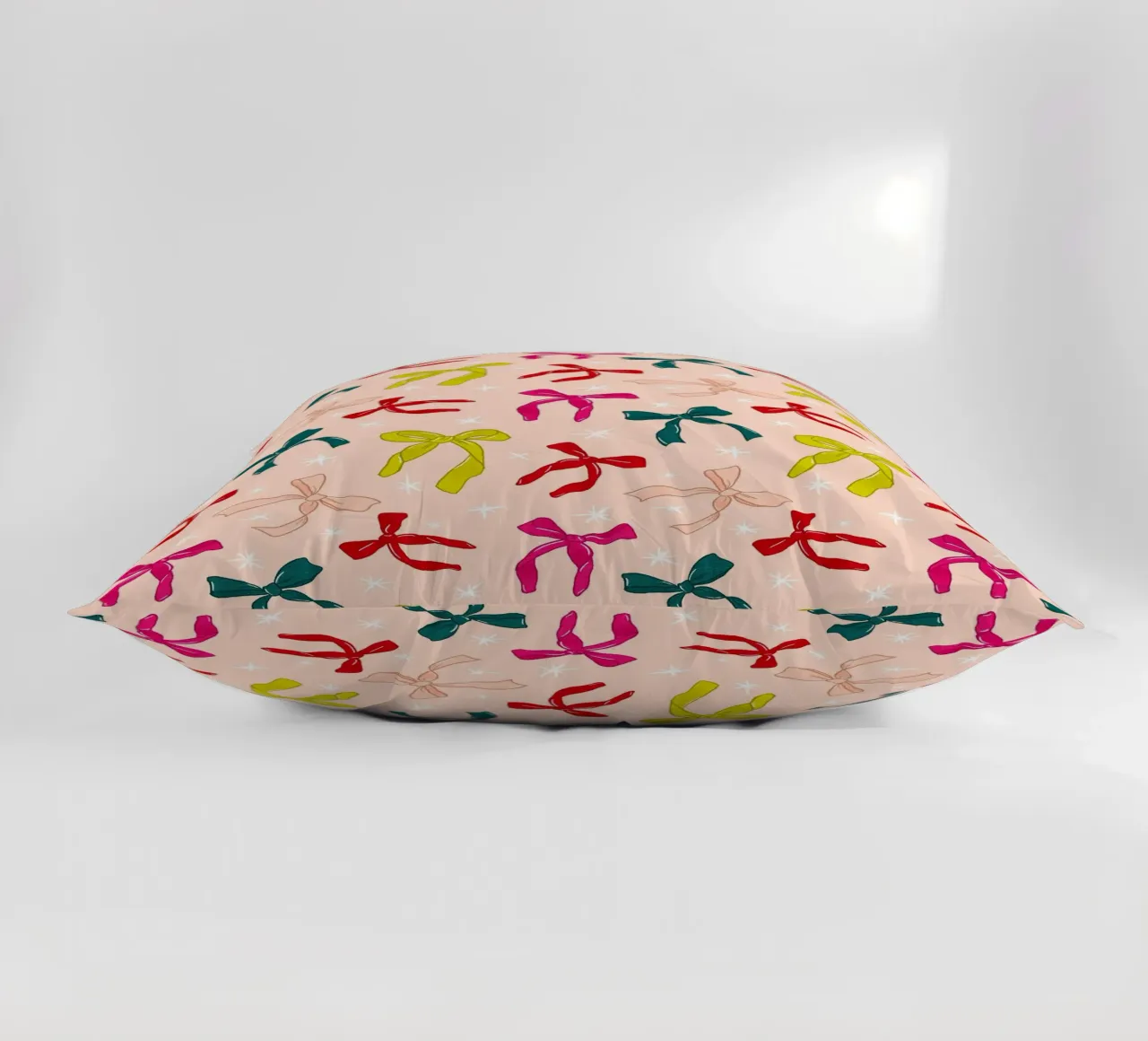 Colorful Bows Pattern on Soft Peach Background cuscino da showmemars